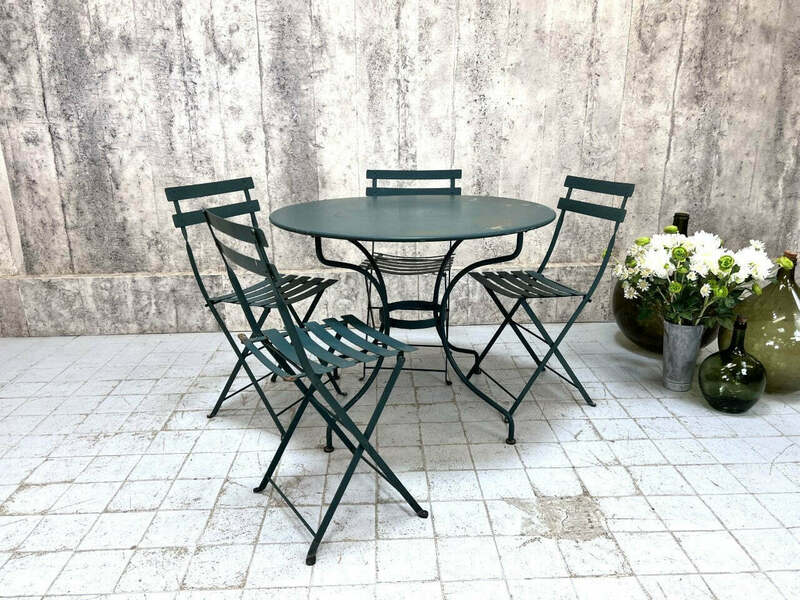 Green Metal Circular Garden Table And 4 Folding Bistro Style Chairs