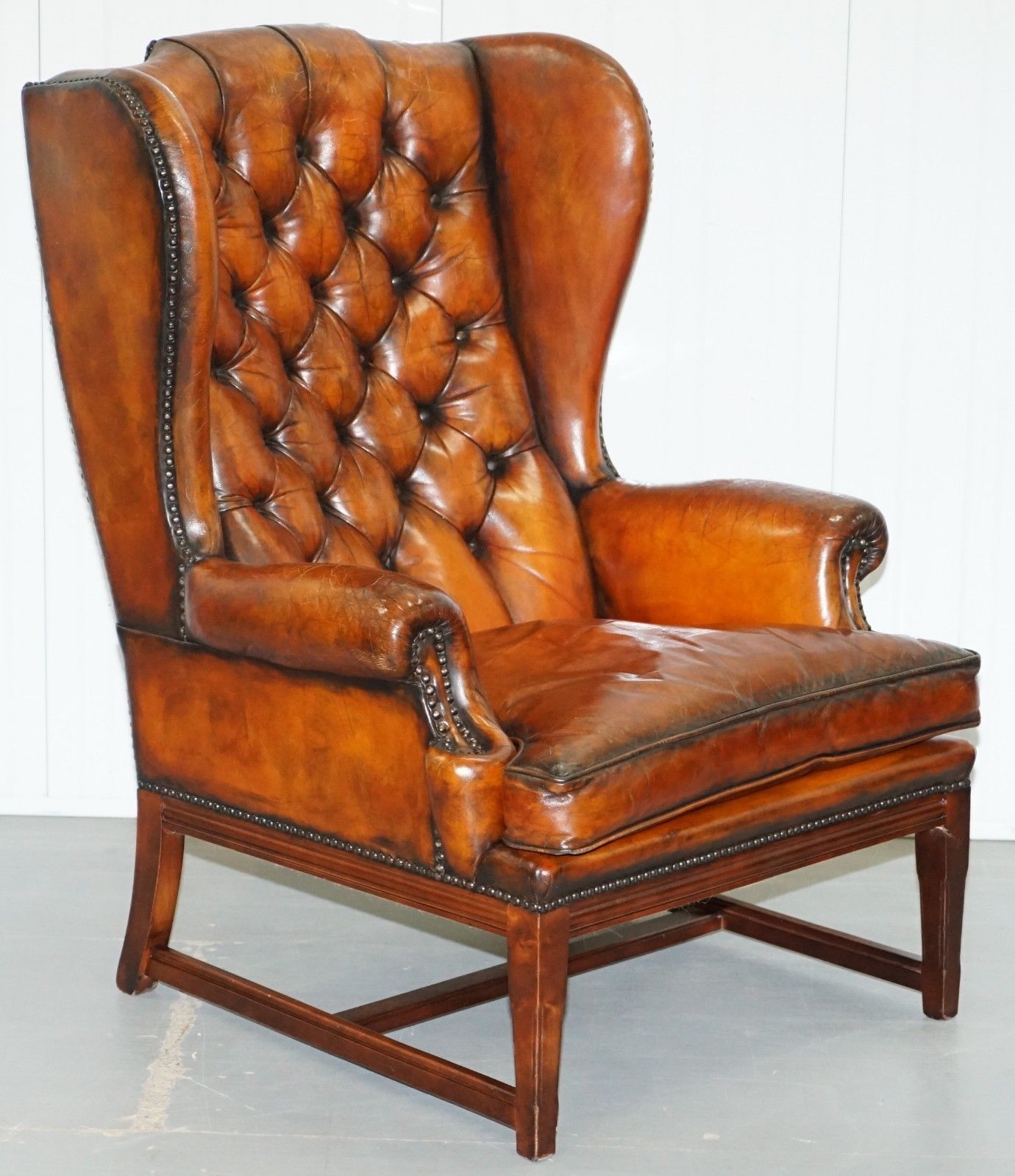 Stunning Whisky Brown Leather Chesterfield Wingback Armchair Feather Cushion Stunning Whisky Brown Leather Chesterfield Wingback Armchair Feather Cushion