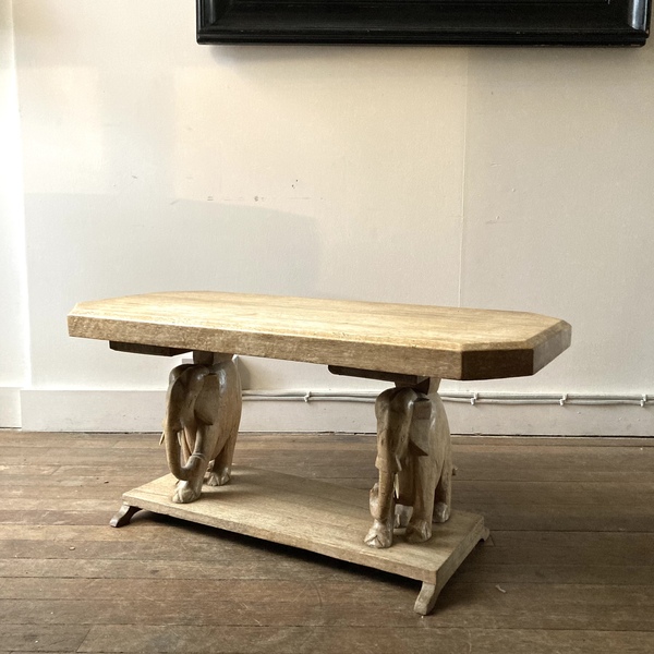 An Exotic Hardwood Low Table With Two Elephant Supports, One Minus A Tusk. 1950s