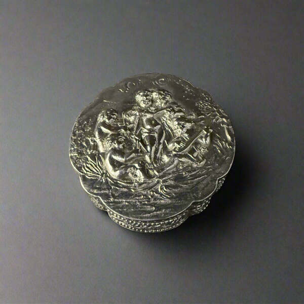 German Silver And Gilt Made Snuff Box Of Moulded Circular Outline With Chases Cherub Motifs Throughout Circa 1890