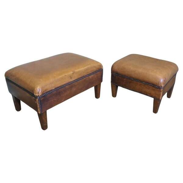 A Set Of Two Sturdy Leather Library Foot Stools