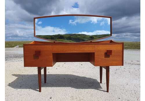 I.B Kofod Larsen For G Plan. A "Danish Line" Bow Fronted, Teak Dressing Table. 1960s