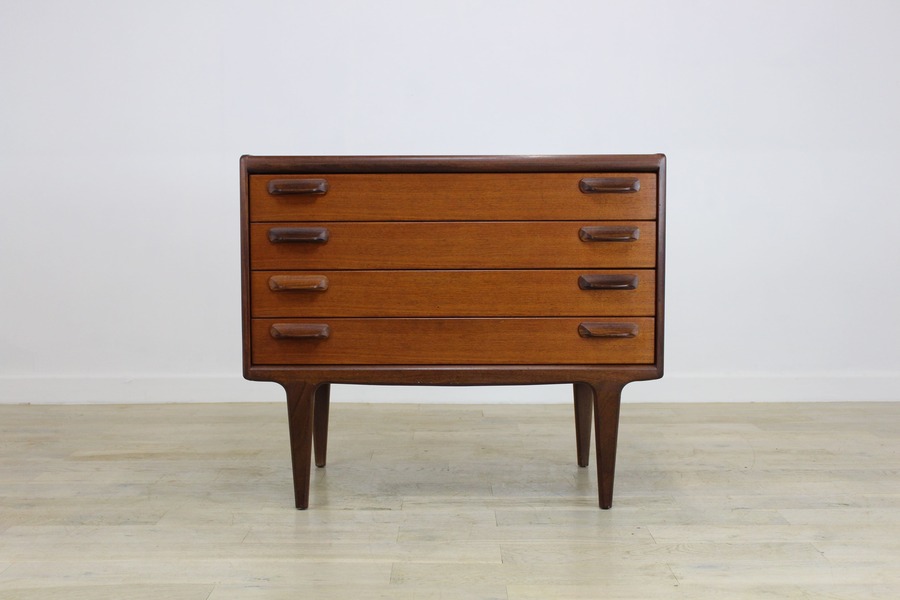 A Younger Sequence Teak Chest Of Drawers