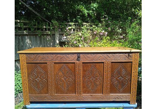 A 19th Century Hand Carved Oak & Mahogany 4 Panelled Coffer With Original Key.