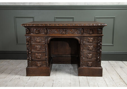 A Late C19th Solid Carved Oak Green Man Kneehole Desk, C. 1890