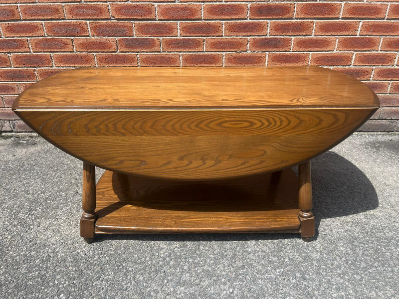 Ercol Elm Golden Dawn Stylish Dropleaf Coffee Table With Potboard Base
