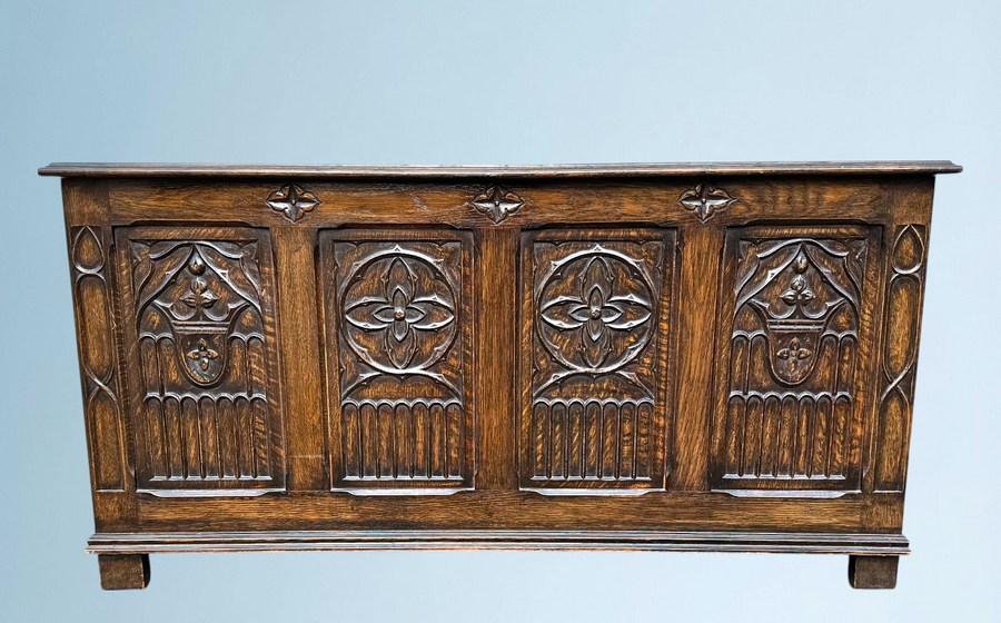 A Large Carved Oak Bedding Or Blanket Box With Raised Linen Fold Panels