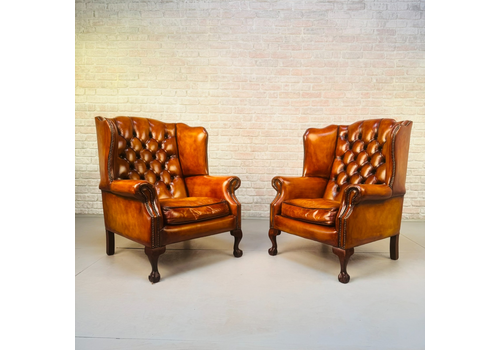 Vintage English Pair Of Hand Dyed Tan Leather Wingback Chairs