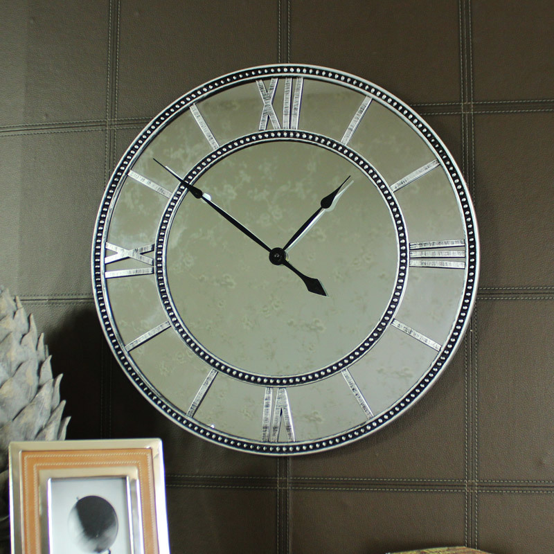 Large Mirrored Skeleton Style Wall Clock With Roman Numerals