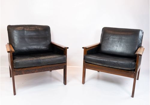 A Pair Of Armchairs, Model Capella, In Rosewood And Black Elegance Leather Designed By Illum Wikkelsø From The 1960s.