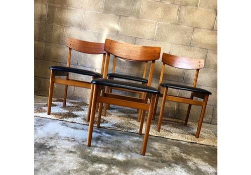 A Set Of Vintage Danish Dining Chairs Teak With Black Vinyl Seats